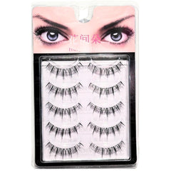 Pack of false eyelashes with a model wearing them on a white background
