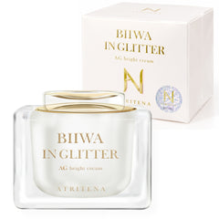 ATRITENA Biiwa in Glitter AG Bright Cream 50g Japanese SPF15 tone-up face cream-The Cosmetic Store-A clear glass jar of Atritena Biiwa In Glitter AG Bright Cream with a gold lid, shown in front of its white and gold outer packaging box.RENEWAL 2025 
