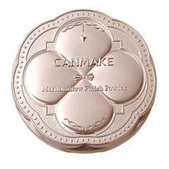 CANMAKE Marshmallow Finish Powder compact in a metallic rose gold color, featuring a four-petal flower design and embossed brand name.