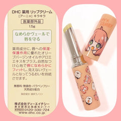 DHC Arnyu Kira Cream lip balm with anime character illustrations on the tube and cap, shown next to its product packaging card on a pink background.