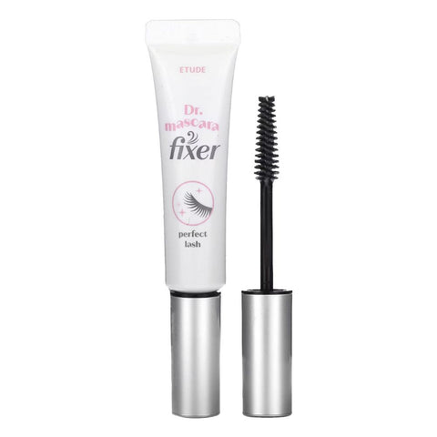 Dr. Mascara fixer mascara with applicator on a white background