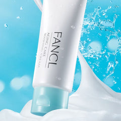 FANCL Aging Care Antioxidant Exfoliating Cleansing Cream[ Limited Edition] -THE COSMETIC STORE NZ-A white tube of FANCL Aging Care Washing Cream with a translucent light blue cap, shown with a splash of white cleanser against a bright blue water-and-splash background.