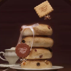 Stack of bread with decorative elements -Stack of bread rolls with decorative elements -Close-up of a woman wearing a hair clip with 'Flower Knows' branding.- Flower Knows The Sweetie Bear Collection Biscuit Hair Clip -COCOA 1pcs