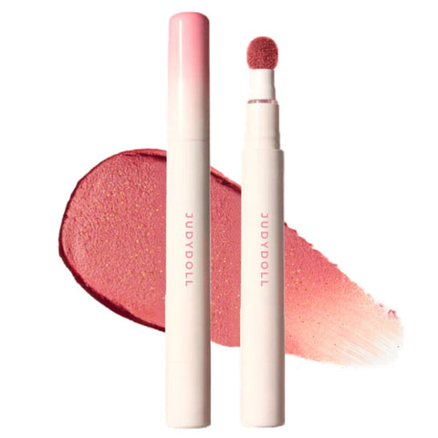 Two lip products with a swatch of pink color- Judydoll Cushion Lip Powder Cream- N22 Bouncy Cinnamon [With subtle Simmer]-THE COSMETIC STORE NZ