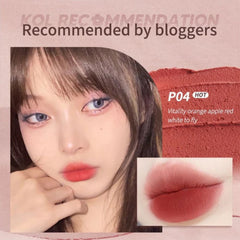 Lipstick with a close-up of lips wearing it, labeled -JUDYDOLL Lip Mud 3.3g -P04 Apple Peel [Warm Apple Red]-THE COSMETIC STORE NZ
