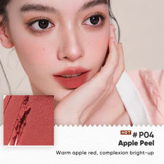 Close-up of a person with a warm apple red lip color swatch labeled 'Apple Peel' - JUDYDOLL Lip Mud 3.3g -P04 Apple Peel [Warm Apple Red]-THE COSMETIC STORE NZ