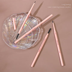 Mishiti Ultra-Fine Waterproof Eyebrow Pencil - 05 Dark Brown-Set of pink makeup pencils with brush tips on a brown surface