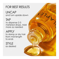 Bottle of Olaplex hair oil with usage instructions - OLAPLEX Ultimate Bond Repair Trio | No.4 Shampoo + No.5 Conditioner + No.7 Bonding Oil- THE COSMETIC STORE NZ.