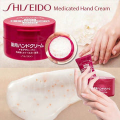 Shiseido Medicated Hand Cream with packaging and application on hands- intensive repair hand cream Shiseido for rough dry skin-The Cosmetic Store NZ.