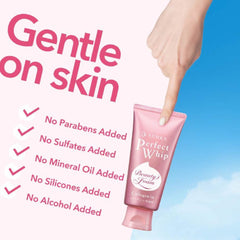 Pink skincare product tube with 'Gentle on skin' text and benefits listed against a blue sky background.- SHISEIDO Senka Perfect Whip Collagen Facial Foam Cleanser 120g-THE COSMETIC STORE NZ