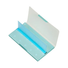 Pull pop detachable design showcasing one sheet of Shiseido oil absorbing paper