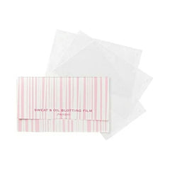 Texture closeup of Shiseido clear oil control film sheet showing microscopic pores