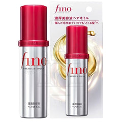Two bottles of Fino Premium Touch hair oil with red caps and silver bodies, shown alongside their retail packaging card on a white background.- Shiseido Fino Premium Touch Hair Oil 70ml-The Cosmetic Store