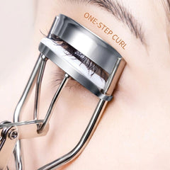 Eyelash curler with 'ONE-STEP CURL' text being used on eyelashes.