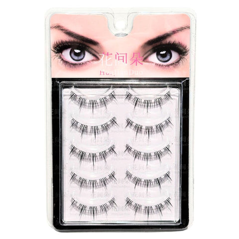 Set of false eyelashes in a packaging case with a model wearing them.