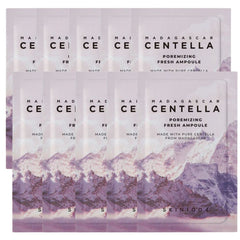 Multiple boxes of Madagascan Centella Poreminizing Fresh Ampoule with mountain landscape design.