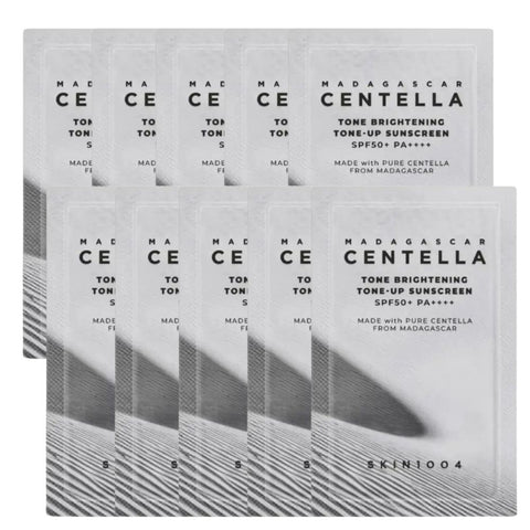 Multiple boxes of Madagascar Centella sunscreen with branding on a white background