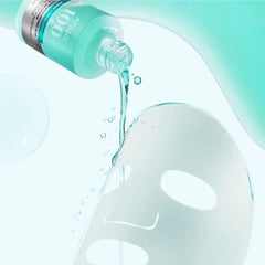 Anua PDRN Hyaluronic Acid Capsule 100 Serum Mask Sheet 1 ea- Bottle of serum being poured onto a face mask 