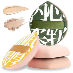 Makeup applicators with geometric patterns and swatches of beige makeup on a white background