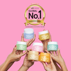 Hands holding various colored 'clean it zero' skincare products against a pink background with a gold badge declaring it as 'Global No.1 Cleansing Balm'.