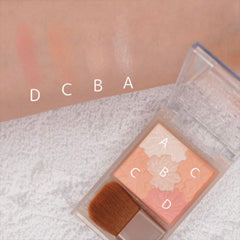 CANMAKE Glow Fleur Cheeks Blend Type -B01 Cotton Coral-Makeup product with color swatches labeled D, C, B, A on a textured surface.