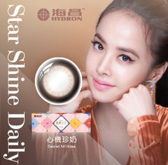 Promotional image of a woman with a product labeled 'Star Shine Daily' and 'HYDRON'.