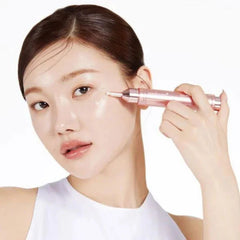 Applying MEDICUBE Booster Serum to prep skin for skincare routine