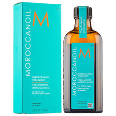 Moroccanoil treatment bottle and packaging on a white background