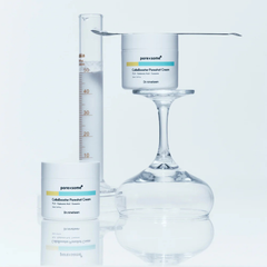 Poresome CalmExfoliate Porewash Cream with a glass beaker and measuring cylinder on a light blue background