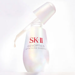 SK-II Genoptics Infinitaura Essence bottle on a white background