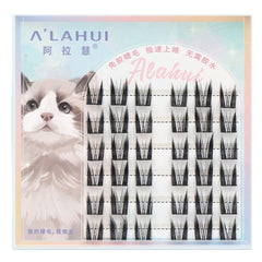 Box of Alahui Pure Desire Cat Elf False Lashes showing a row of black synthetic fiber lashes with an adhesive strip behind them.