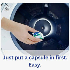 Hand placing a capsule into a washing machine with text 'Just put a capsule in first. Easy.'