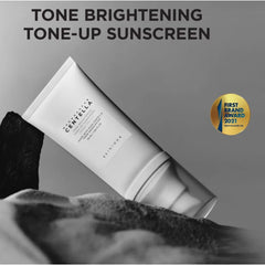 Tube of sunscreen with 'First Brand Award 2021' badge on a gray background