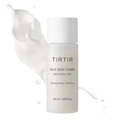 TIRTIR Milk Skin Toner bottle with toner splash on a white background