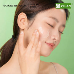 Woman applying cream to her face with a green background, featuring Nature Republic branding.MAY Beauty Rewards FREE Aloe Glow Set with aloe vera gel and MEDIHEAL sheet mask-THYE COSMETIC STORE NZ