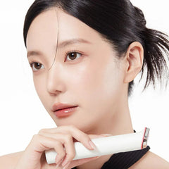Age-R Booster Pro Mini White- Mother’s Day BOGO Set [Buy 1 get 1 Free]-Woman holding a white electronic device with a black strap on a white background