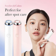 Age-R Booster Pro Mini White- Mother’s Day BOGO Set [Buy 1 get 1 Free]-Woman using a skincare device with text 'Soothes & Calms' and 'Perfect for after spot care' on a pink background.