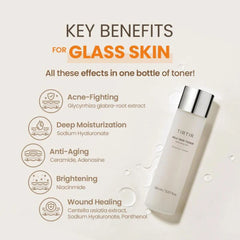 Toner bottle with key benefits for glass skin on a beige background