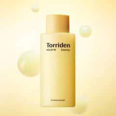 Torriden Solid In Essence bottle on a yellow background