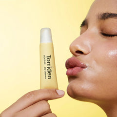 Person using Torriden lip essence -Torriden SOLID IN Ceramide Lip Essence 11ml squeeze tube 
