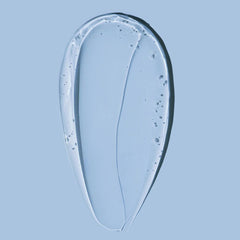 Transparent leaf-like object on a light blue 
