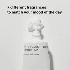 Korean hand cream with fresh winter scent- White hand cream bottle with 'innisfree' branding 