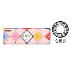 A box of Star Shine Beauty Tricks contact lenses with a grey color scheme design, displayed alongside a close-up of the lens texture.